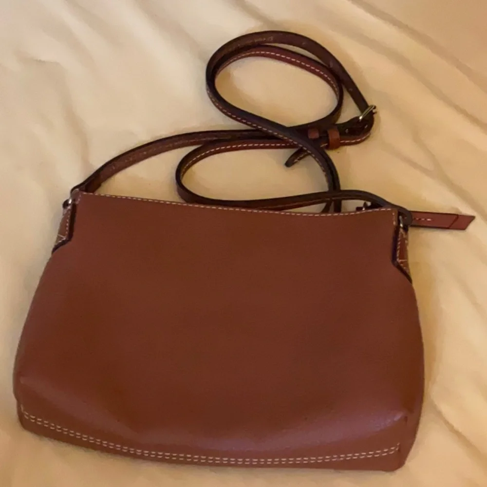 Dooney & Bourke this elegant